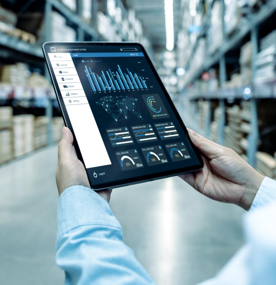 A tablet showing live operational data in a warehouse
